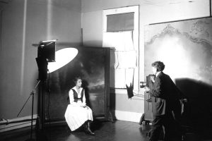 Adeline Cochems having her portrait taken by her father Edward W, Cochems in Santa Ana, California